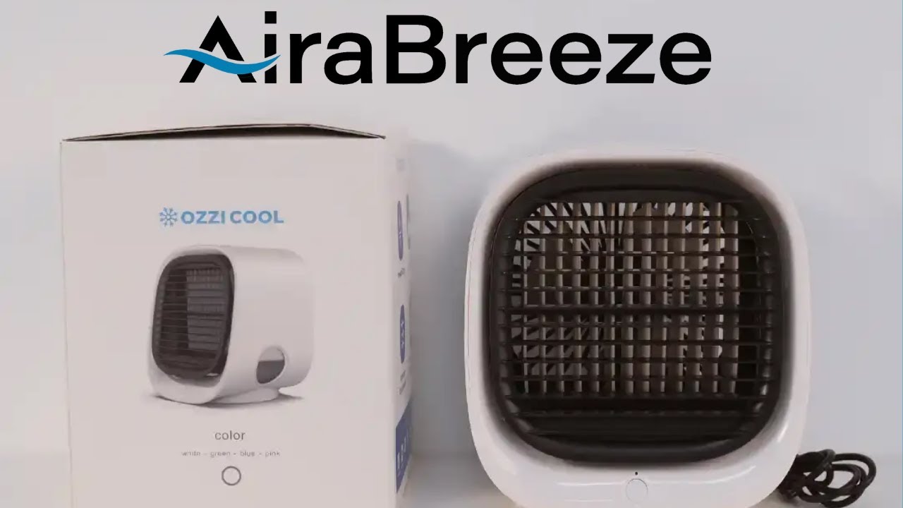 Woman enjoying cool airflow from AiraBreeze Mini Portable Cooler in a modern Australian home during a hot summer day.